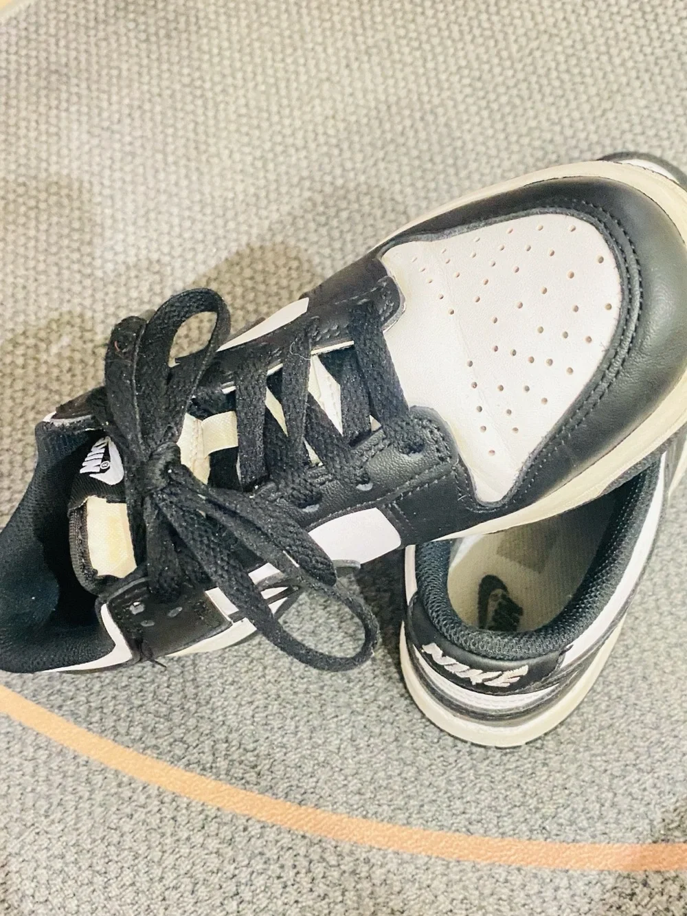 Nike Women’s Black and White Low-Top Sneakers with Swoosh